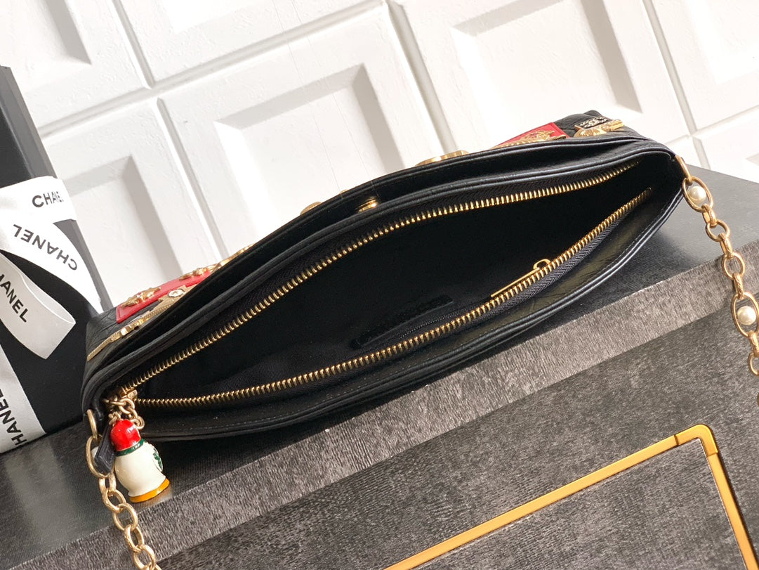 Chanel Paris Moscow Romanov charms bag. Love the purses black